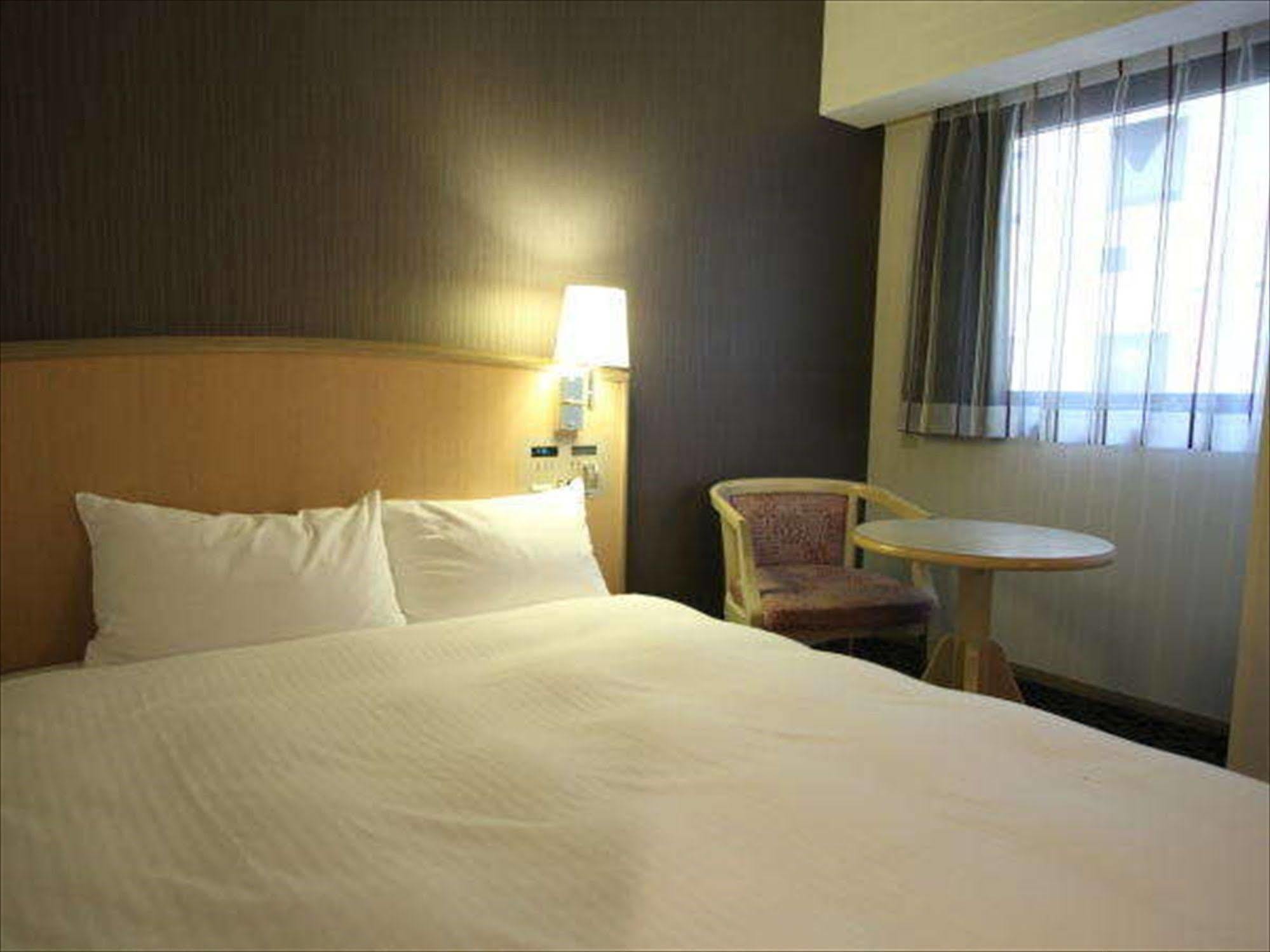 Gr Hotel Esaka Suita Esterno foto