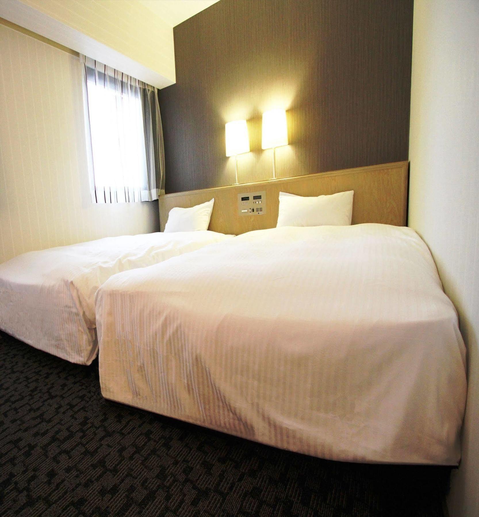 Gr Hotel Esaka Suita Esterno foto